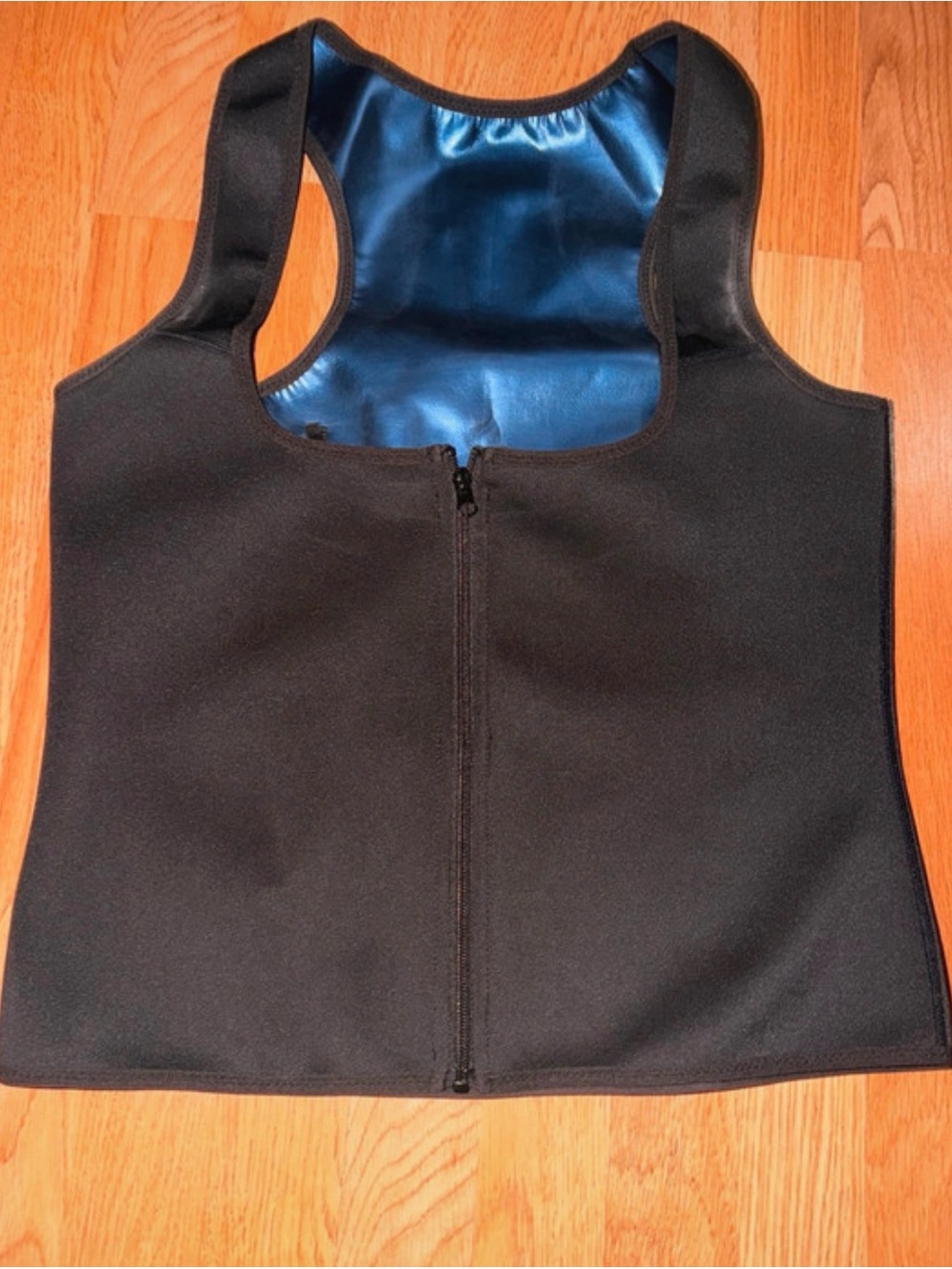 Amazon Women's Black Zip-Front Vest with Blue Lining